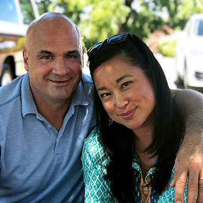 happy couple with filipino woman